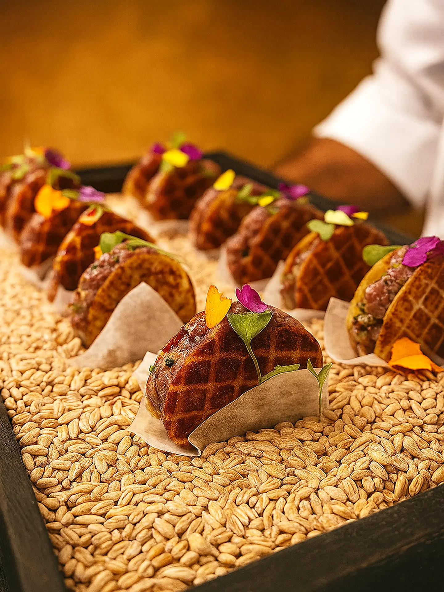 Waffle tacos garnished with edible flowers